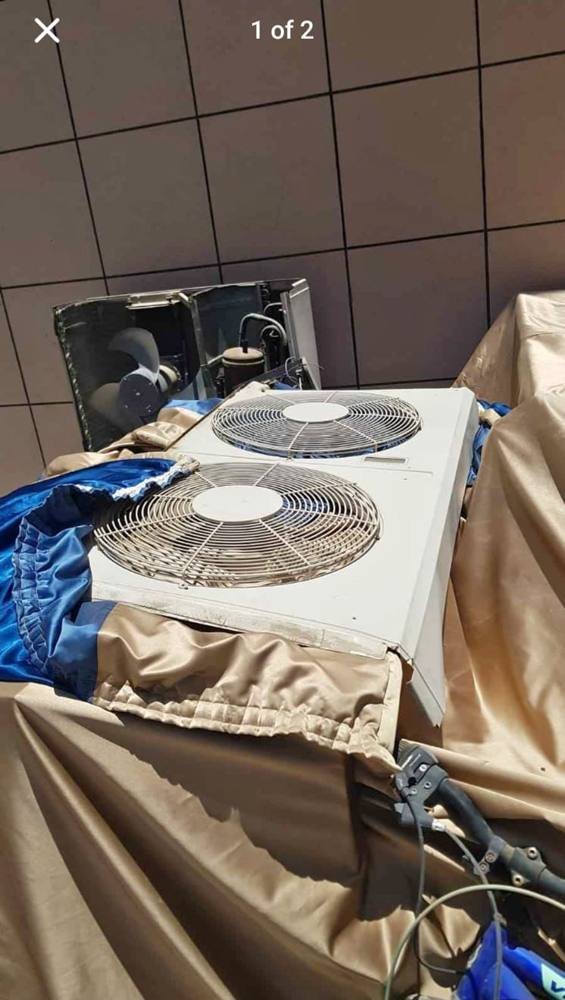 Old outdoor AC condenser unit for scrap