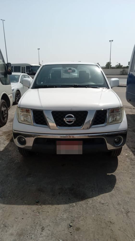 White pickup truck for scrap car buying